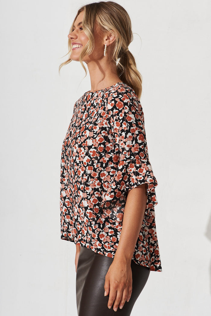 Nila Top In Black With White And Red Floral - side