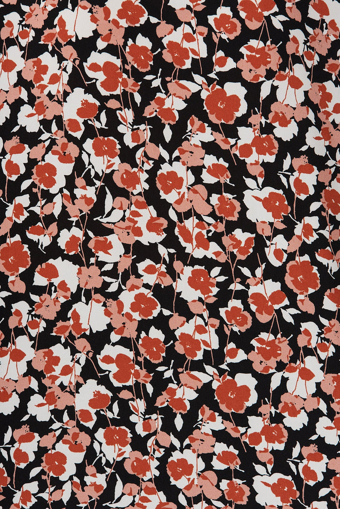 Nila Top In Black With White And Red Floral - fabric