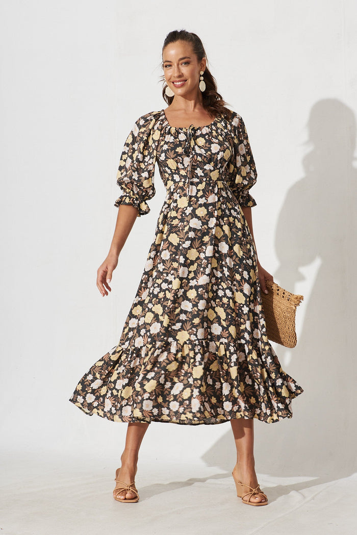 Poppy Midi Dress In Black With Brown And Yellow Floral - full length