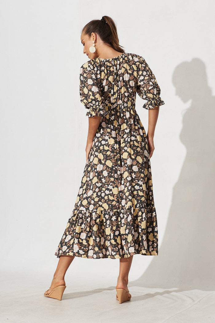 Poppy Midi Dress In Black With Brown And Yellow Floral - back