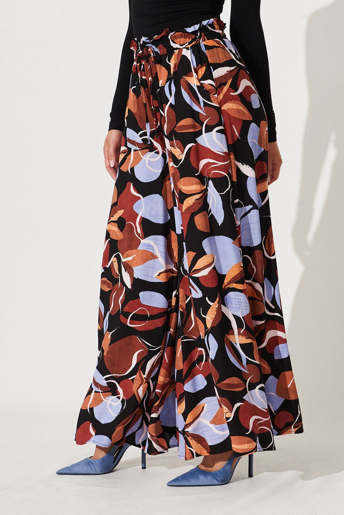 Mariah Pant In Black With Brown And Blue Leaf Print - side