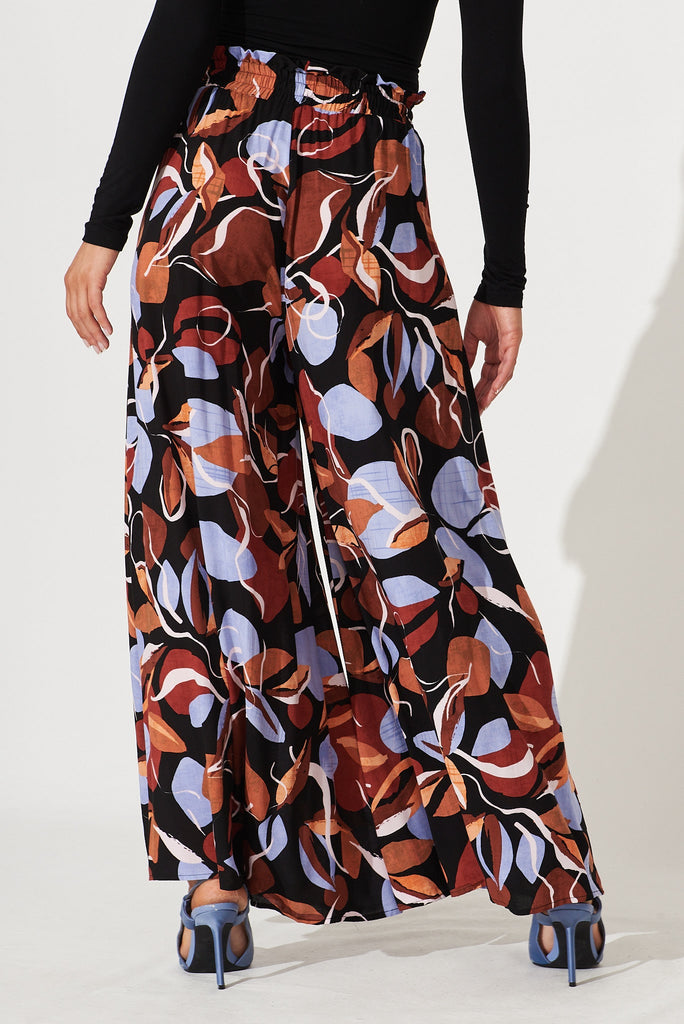 Mariah Pant In Black With Brown And Blue Leaf Print - back