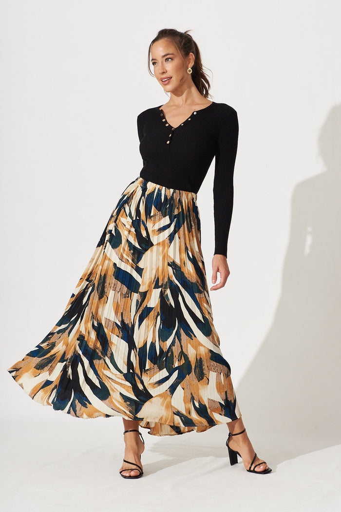 Lyon Pleated Midi Skirt In Rust With Cream And Black Print - full length