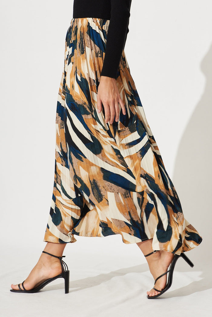 Lyon Pleated Midi Skirt In Rust With Cream And Black Print - side