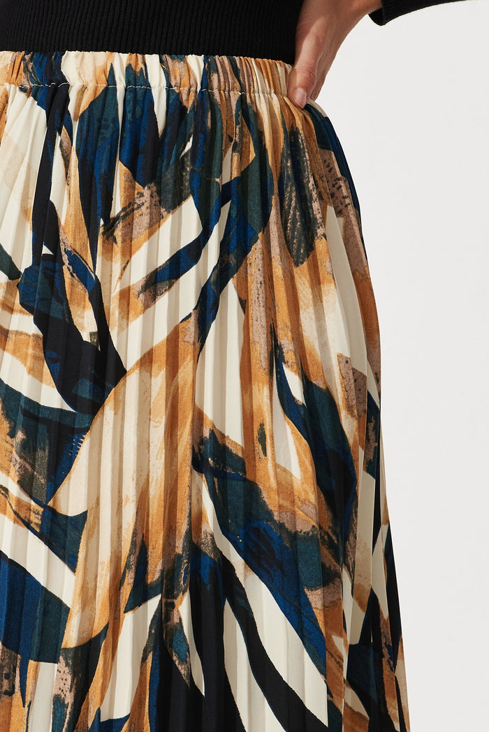 Lyon Pleated Midi Skirt In Rust With Cream And Black Print - detail