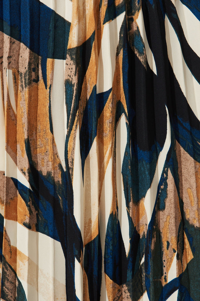 Lyon Pleated Midi Skirt In Rust With Cream And Black Print - fabric