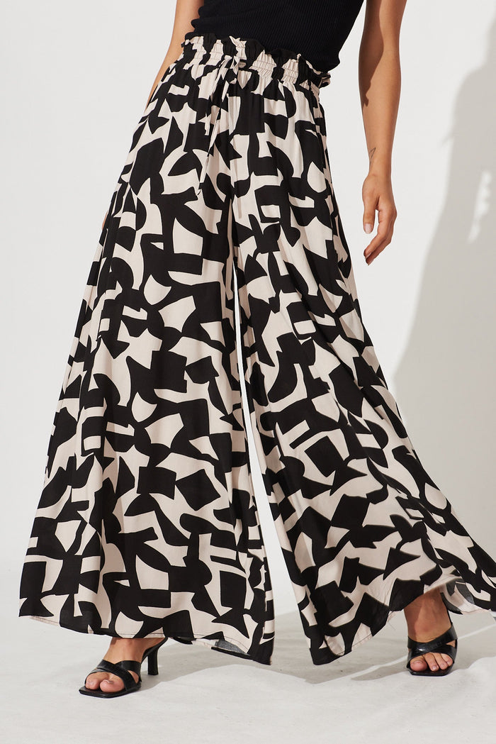 Mariah Pant In Black And Sand Geometric Print - front
