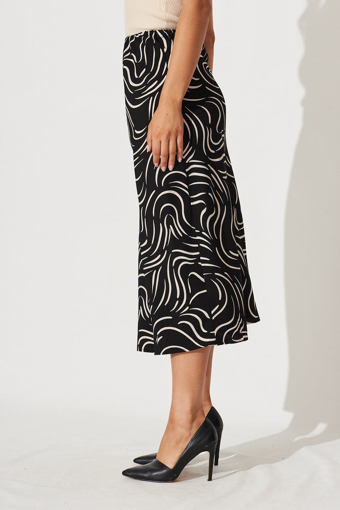 Monica Midi Skirt In Black With Sand Swirl Print - side