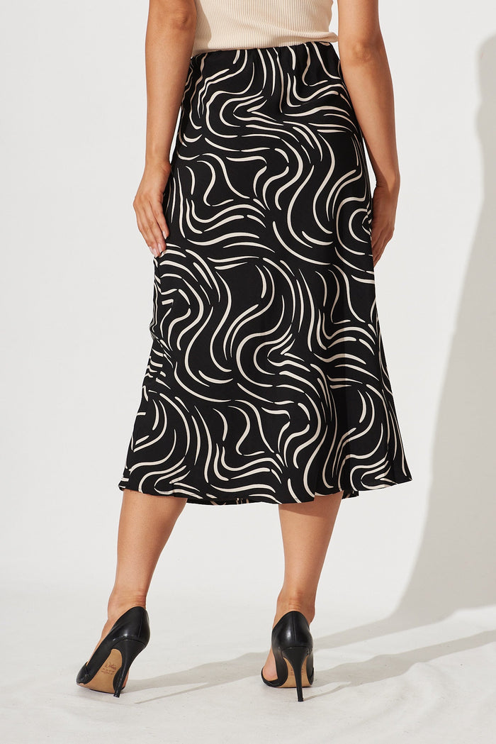 Monica Midi Skirt In Black With Sand Swirl Print - back