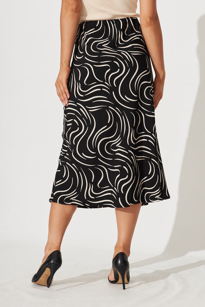 Monica Midi Skirt In Black With Sand Swirl Print - back