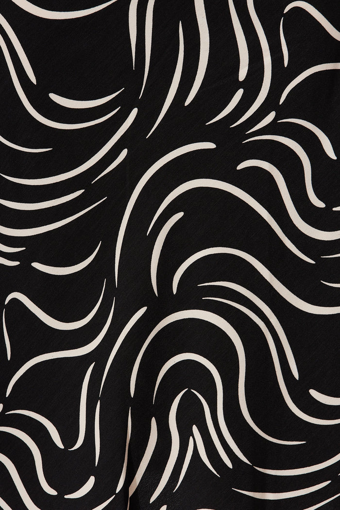 Monica Midi Skirt In Black With Sand Swirl Print - fabric