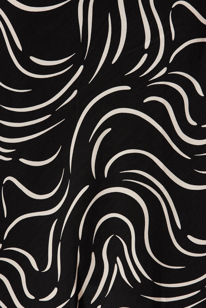 Monica Midi Skirt In Black With Sand Swirl Print - fabric