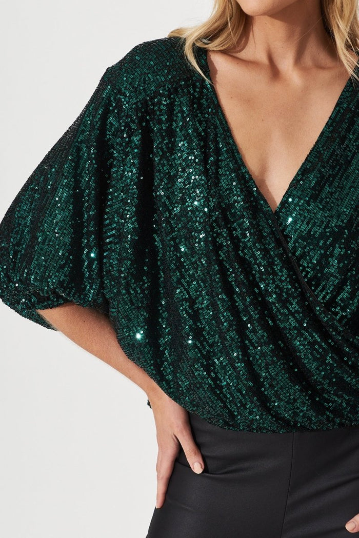 Celebration Sequin Mock Wrap Top In Green - St Frock (Dev)