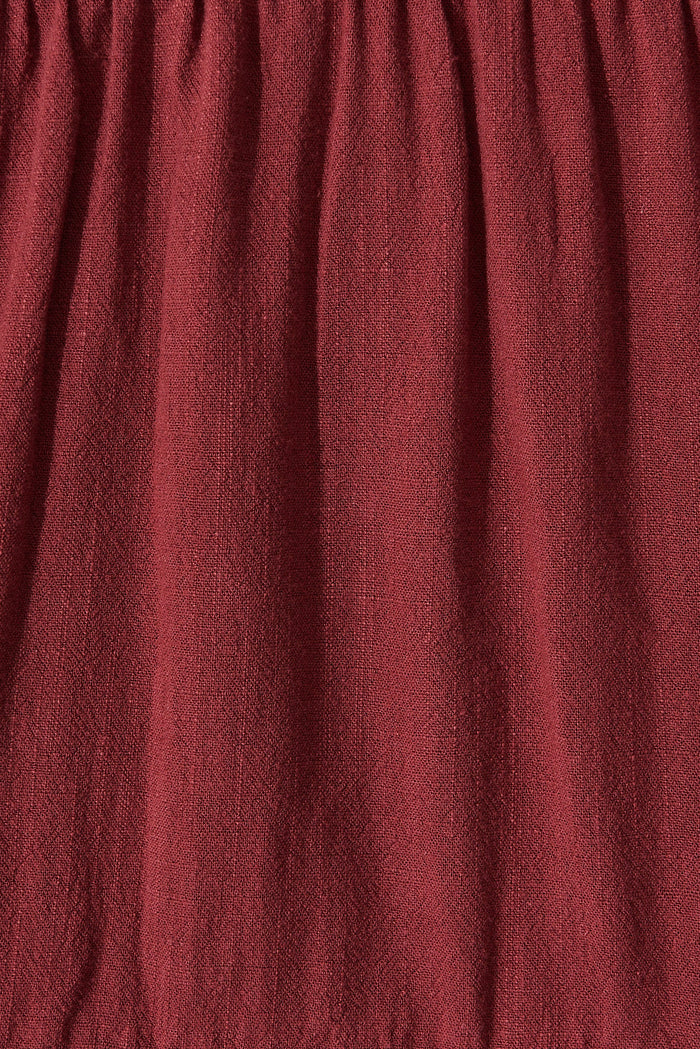 Trixie Tiered Smock Dress In Berry Linen - fabric